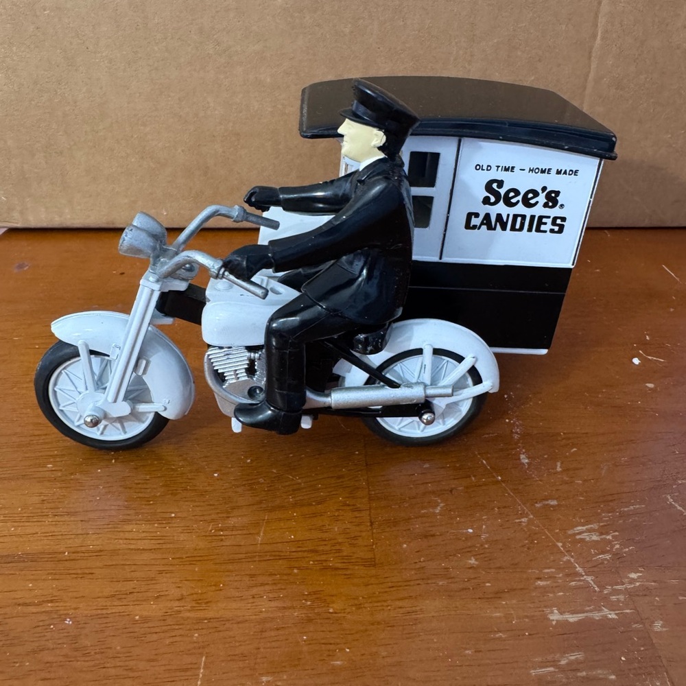 Sees Candie's Black and White Toy Motorcycle